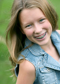 stock photo of girl outside with braces