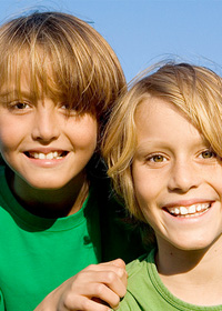 stock photo two brothers outdoors